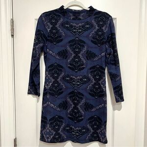 Free People Bodycon Mini Dress in Navy/Purple Pattern. 3/4 length sleeves.